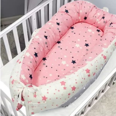 reducteur-de-lit-bebe-rose