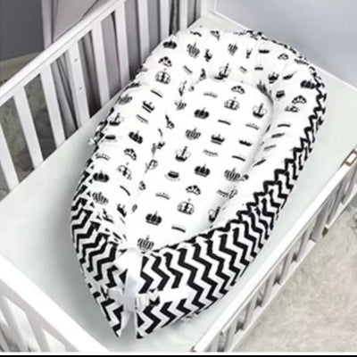 reducteur-de-lit-bebe-sécurité-optimale