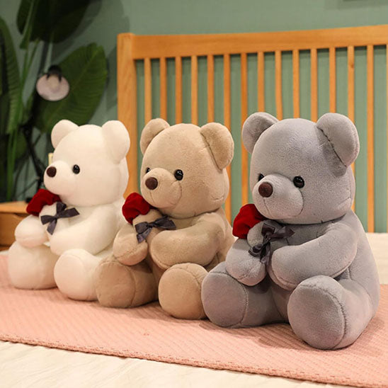 Doudou-ours-mignon-avec-fleur-rose