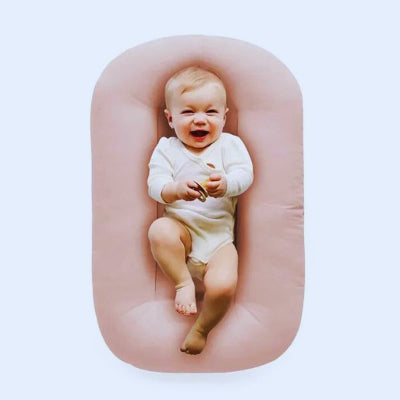 Réducteur-de-lit-bébé-rose
