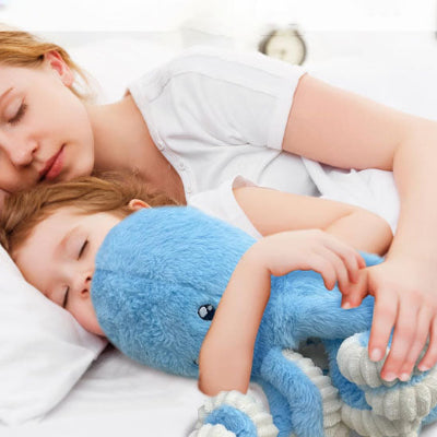 bebe-dort-avec-Doudou-pieuvre